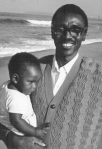 Shihala Hamupembe with daughter Ndahafa on Durban beach in 1975, when he and his family spent a vac with us when he was a student at the Federal Theological Seminary in Pietermaritzburg